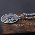 the Wizard wolf head pendant necklace for Geralt with a The Wild Hunt 3 Figure TV